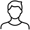 a man with a goatee smiles at the camera